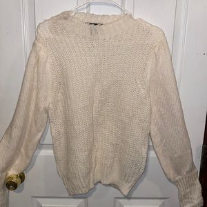White turtleneck sweater
